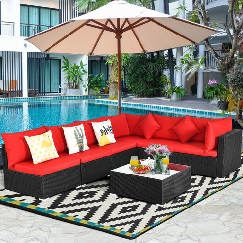 Latitude Run® 7 Piece Rattan Sectional Seating Group with Cushions